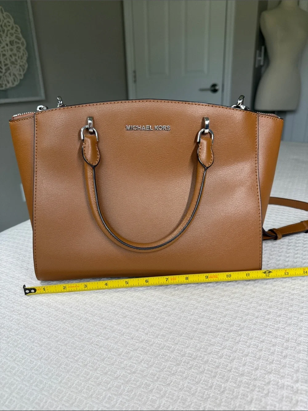 Michael Kors saddle tan saffiano leather satchel with silver hardware